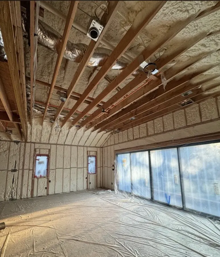 Interior walls and ceiling insulated with spray foam during new construction in Palos Heights